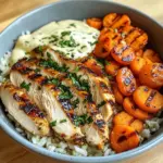 Grilled Chicken Bowl with Herbed Rice, Glazed Carrots & Creamy Sauce